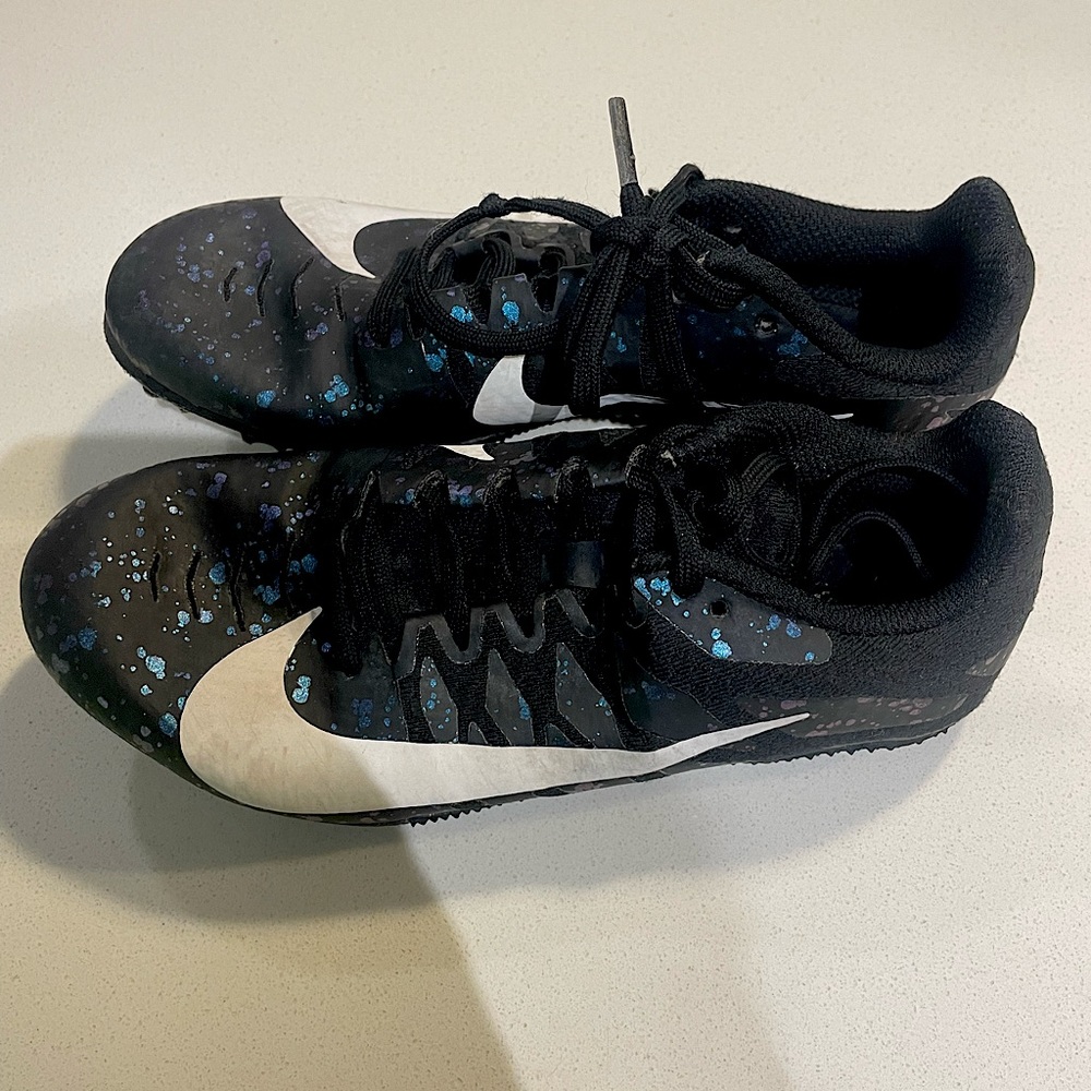 Nike track cleats black and blue